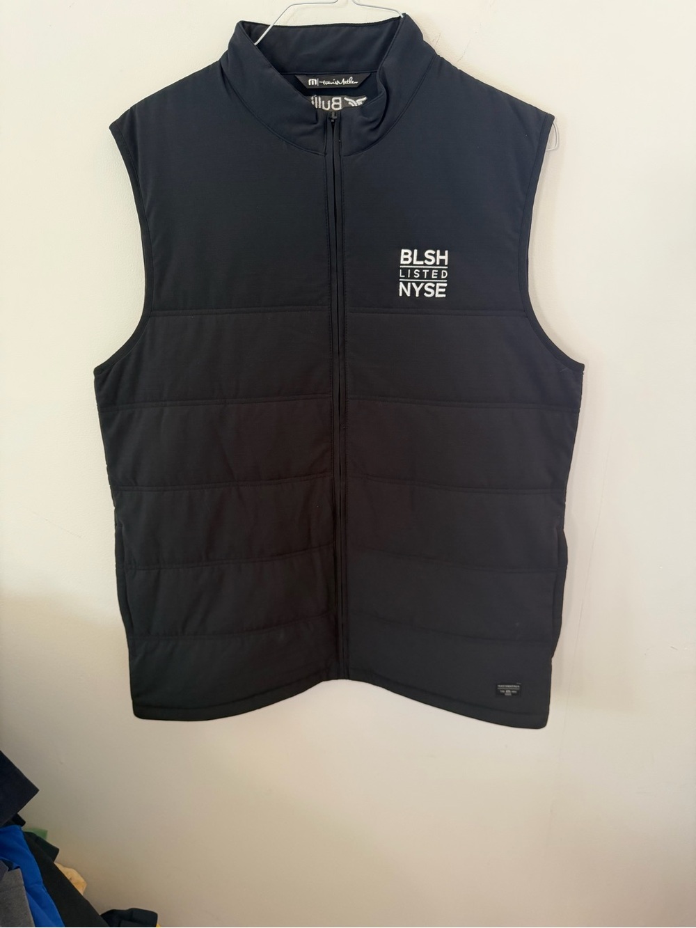 Travis Mathew Black Quilted Stand-Collar Vest with NYSE Chest Logo